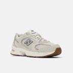 New Balance 530 Beige Estampado de Vaca - vista lateral